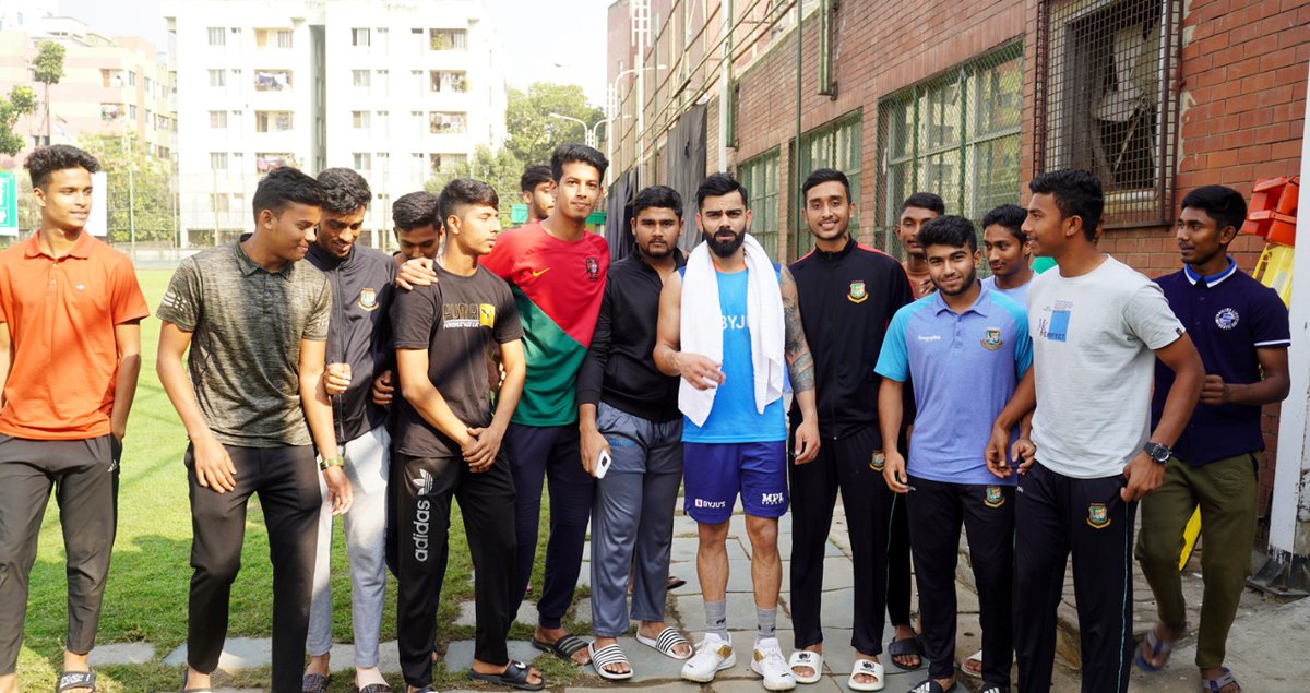 BCCI's tweet image. 𝗜𝗻𝘀𝗽𝗶𝗿𝗶𝗻𝗴 𝗴𝗲𝗻𝗲𝗿𝗮𝘁𝗶𝗼𝗻 𝗻𝗲𝘅𝘁

The Bangladesh U19 team met and interacted with @imVkohli, @RishabhPant17 and @imkuldeep18  in Dhaka today. 

#TeamIndia #BANvIND