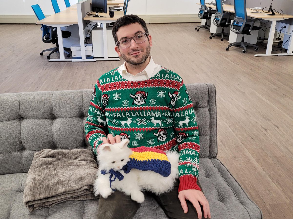 Thanks to our friends at @CPD_FHS_QueensU for sending us this photo of Director @ESoleas and Associate Animatronic Cat Lulu in their finest holiday gear for our @george_lunch campaign. We love to see it! 👏 #holidayseason #holidaygiving #holidaygivingcampaign