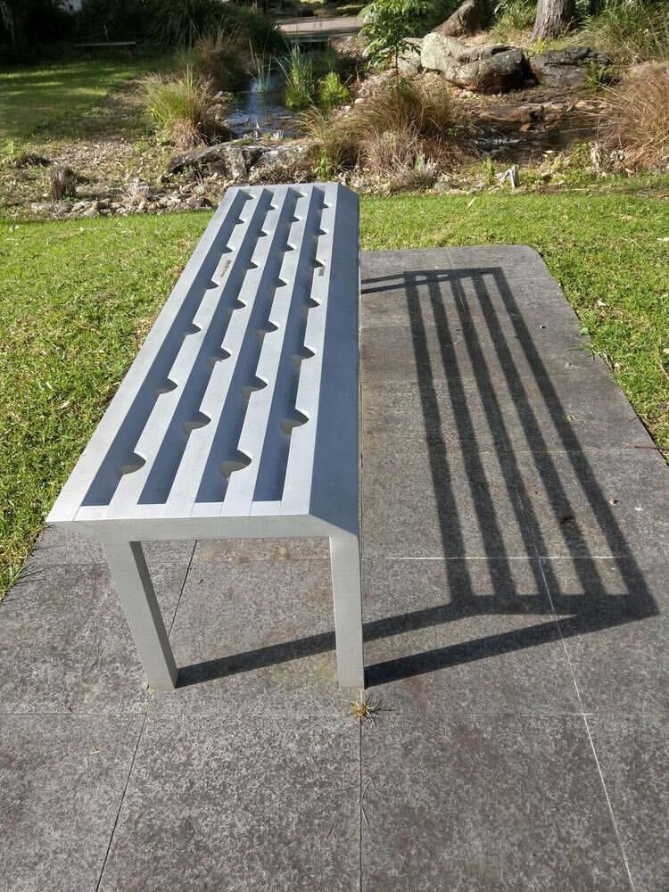 EH_Stonehenge's tweet photo. Meanwhile on the other side of the globe, the 'Solstice bench' is working its magic today. The circular shadows align only on the Solstice to form perfectly straight lines.

Located at @UOW , Australia

📷: Julie Kiggins https://t.co/L8mt3kBFsV