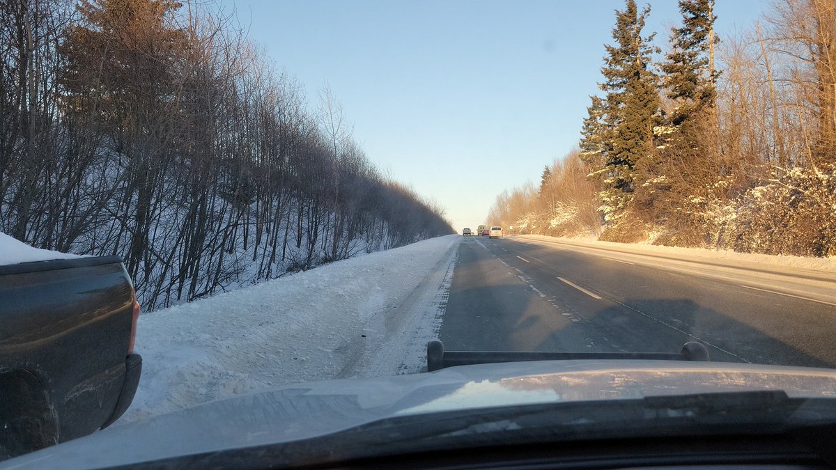 BCHPT11's tweet photo. Even though the sun is shining, the road and highways could be covered in black ice.  Please slow down and drive to the conditions.  That snow blowing across the road is polishing that road surface to a nice shiny slippery surface. https://t.co/tamtvd5Xu0