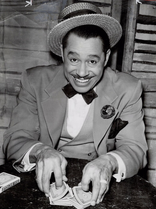 Pick a card, any card...

Cab plays the role of Sportin' Life from the 1952 touring production of the classic American opera Porgy and Bess.

In 1934, George Gershwin created the character with Cab in mind.

#CabCalloway #SportinLife #PorgyAndBess #AmericanOpera #Gershwin