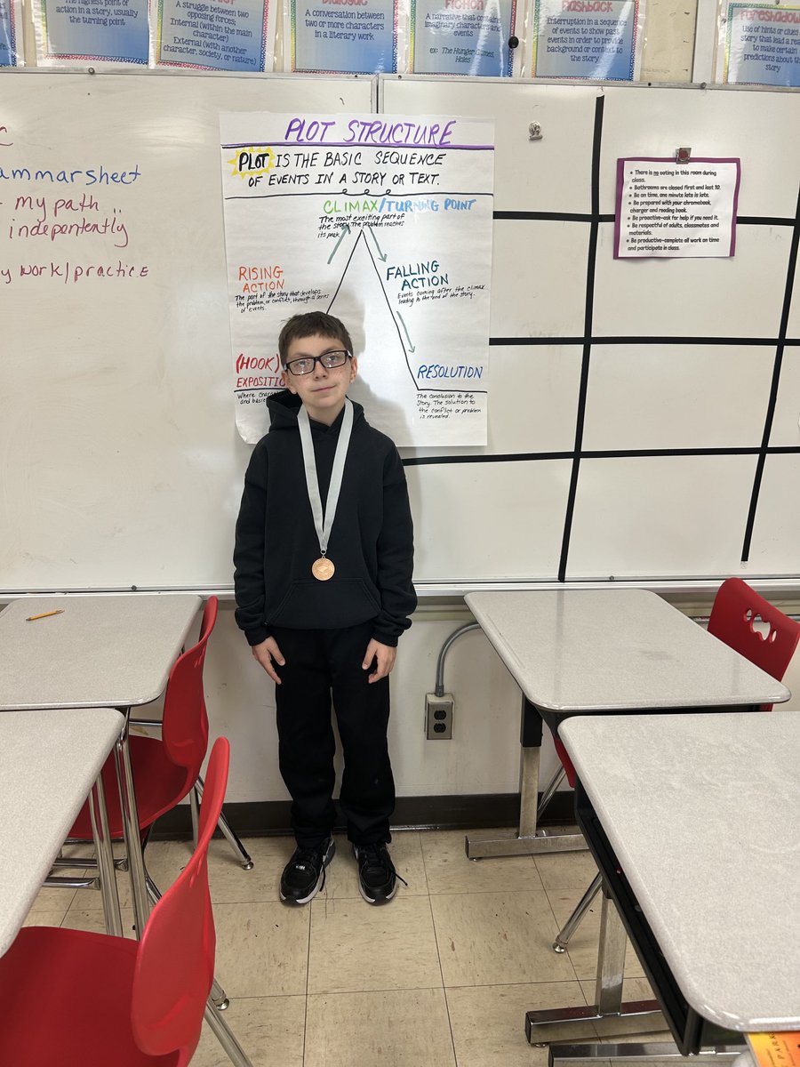 ELARoom105's tweet photo. Congratulations to Miguel Morales for moving up to the silver level in reading. Yes, Miguel is a 7th grader in O’Malley/Franco’s ELA class and he is reading at a HS level. You are awesome Miguel. #wearereaders https://t.co/u0JVWYsTZ6