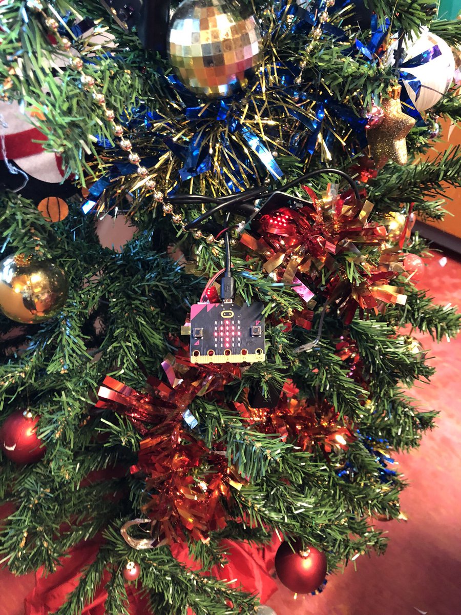 Mrs_C_Stephens's tweet photo. P7P @Clerkhillschool coded Christmas decorations for our tree using Micro:bits. We had a variety of flashing animations and sounds and it looked very effective! #coding @SSERCDigital thanks for the training! https://t.co/krvgKMnzuV