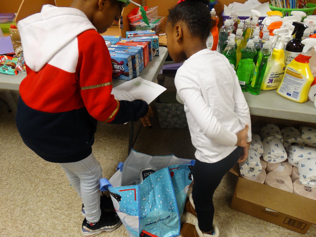 Malachi Center's After-School Program kids &amp; volunteers worked together to prepare supply bags at our "Make One Take One Event"

The totes were filled with household items, toiletries, &amp; gifts.

Together we can make a difference for those in need. 
Donate MalachiCenter.org