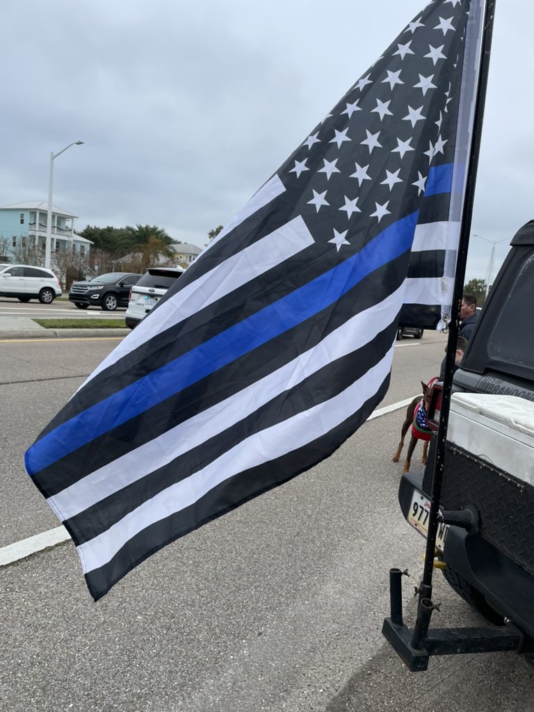 The funeral procession for the two slain Bay St. Louis police officers has been going on now for almost an hour. There are police officers from as far away as Dallas Texas who showed up in support of this community.