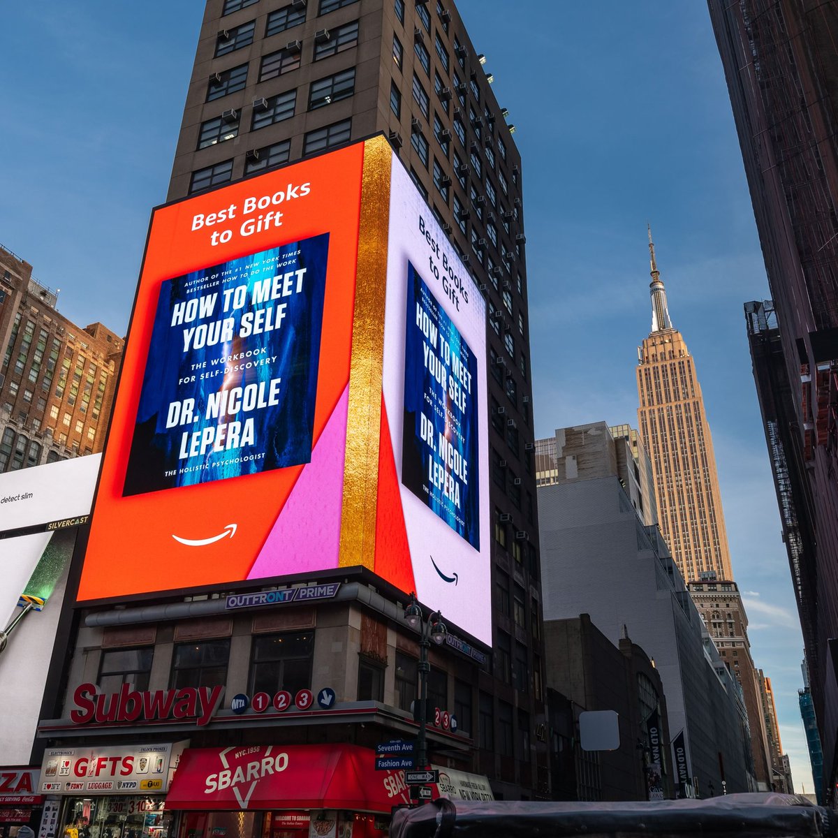Still such a surreal moment to see my workbook up at Times Square 
howtomeetyourself.com