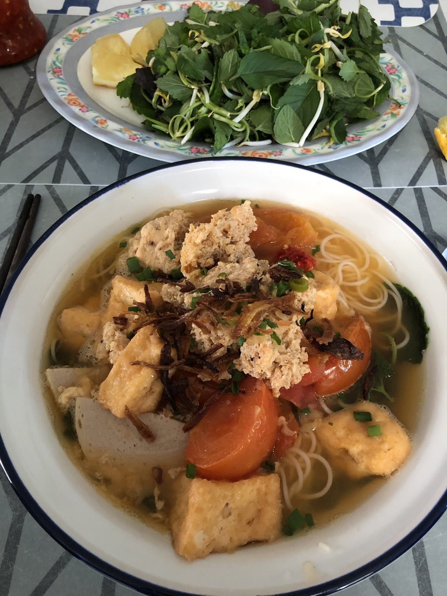 Back at Mum &amp; Dad’s = tofu (made with her hands???) and herbs, beansprouts &amp; lemons from the garden for this crab and tomato noodle soup.