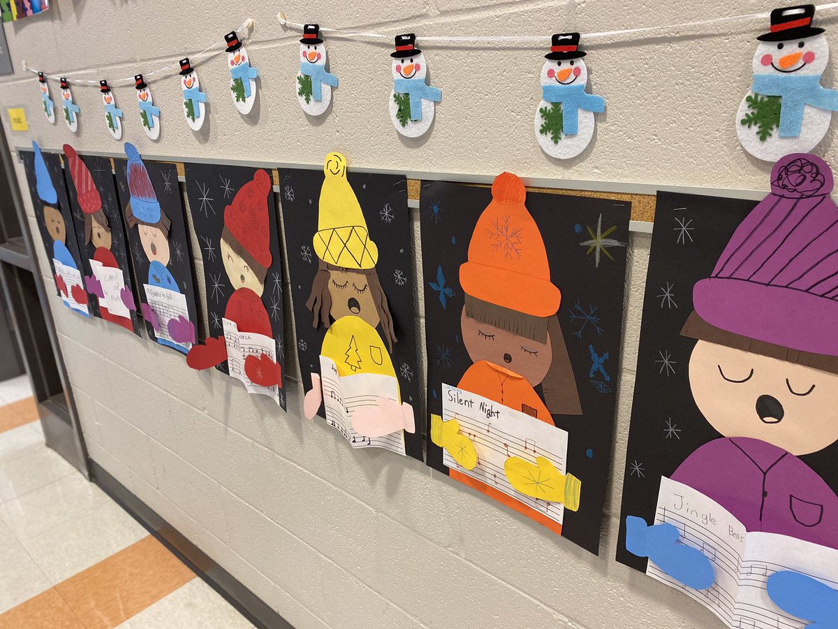 Carolers lining the hallway near the music room….I hope they keep music in the air over holiday break! 😆