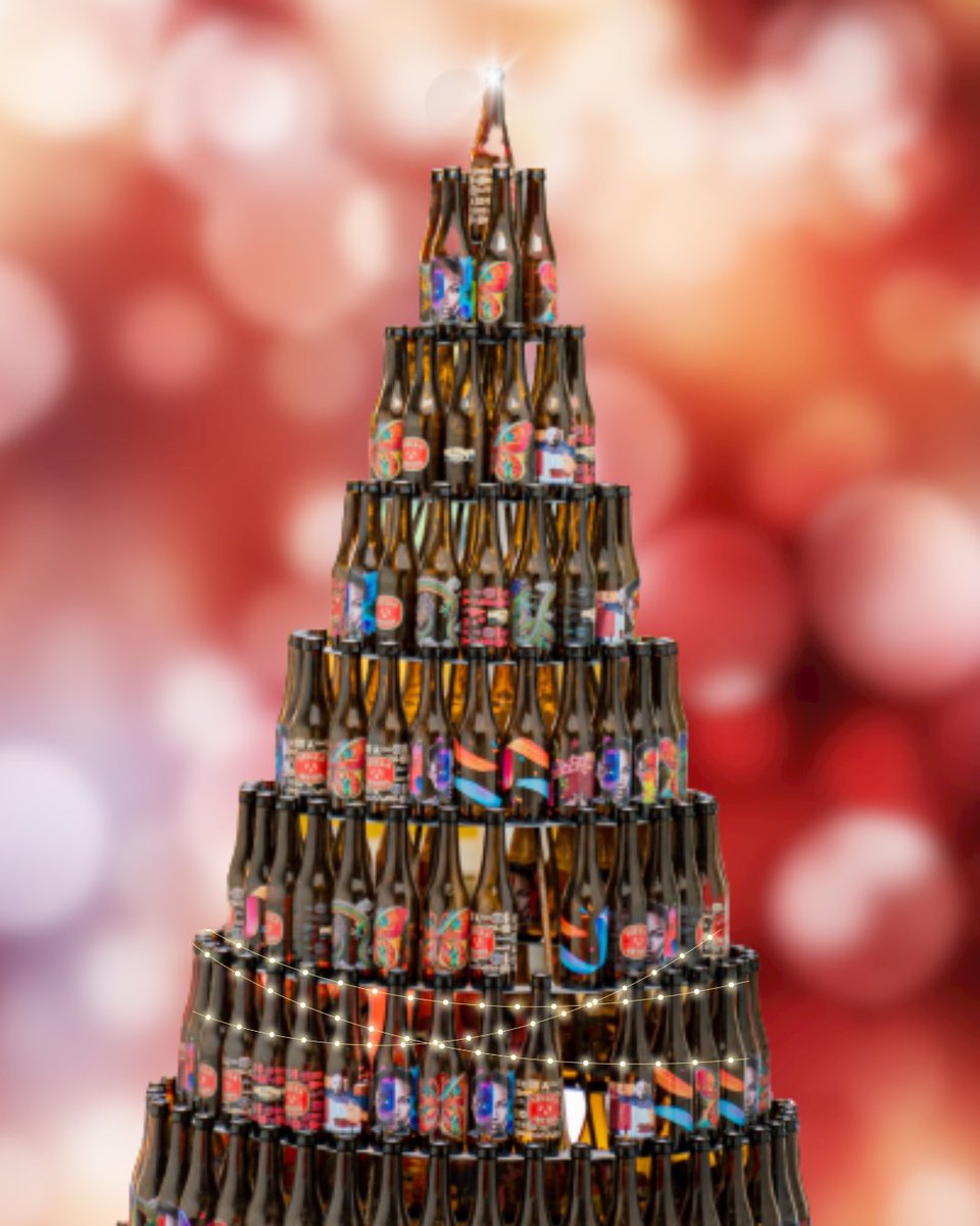 KronesAG's tweet photo. Some wear ugly Christmas sweaters but we dress up!β¨What could be sweeter than this bottle tree with special edition labels created by our #DecoType?πNo matter how or if you celebrate Christmas, we wish you a peaceful holiday! #Krones #KronesAG #GermanBlingBling https://t.co/pt6uTAkWrI