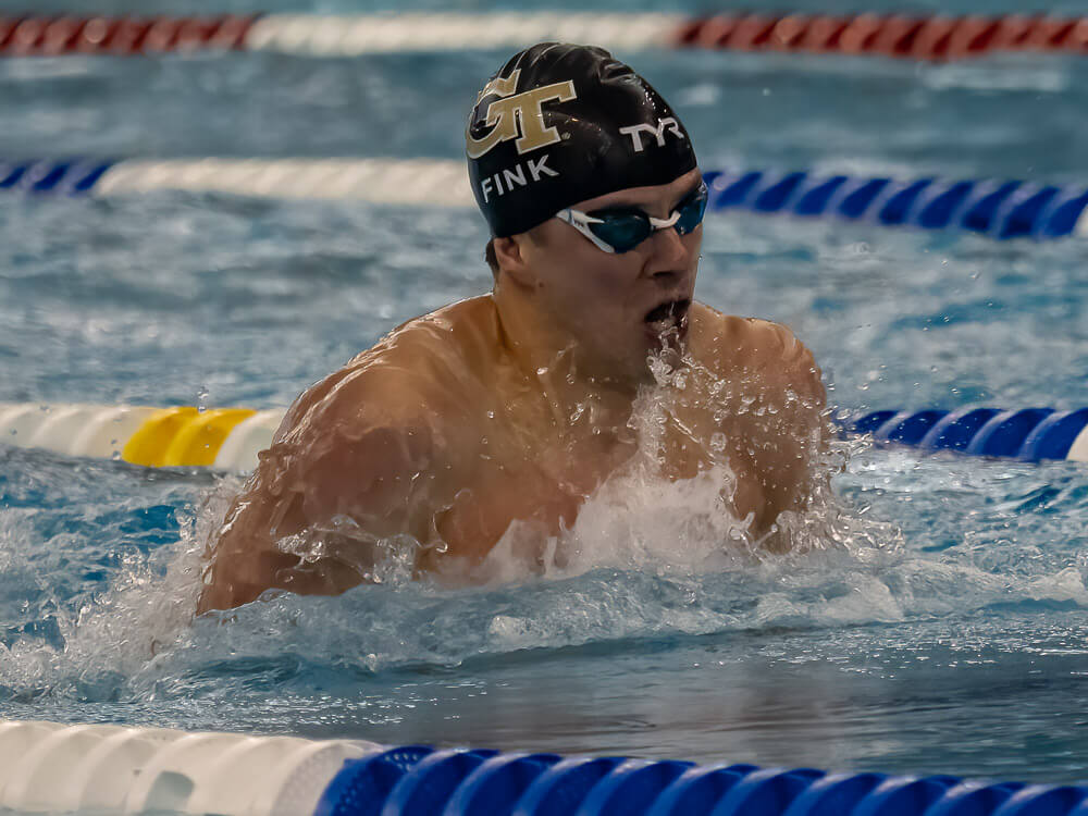 GeorgiaTech's tweet photo. Georgia Tech master’s student Nic Fink took home gold in the 100-meter breaststroke after turning in his final assignment.

The @GeorgiaTech_ECE major completed his coursework 9,688 miles away in Melbourne, Australia, at the FINA World Championships.🥇🏊‍♂️ | https://t.co/TkEF5XGtry https://t.co/DSFrwk6ejz