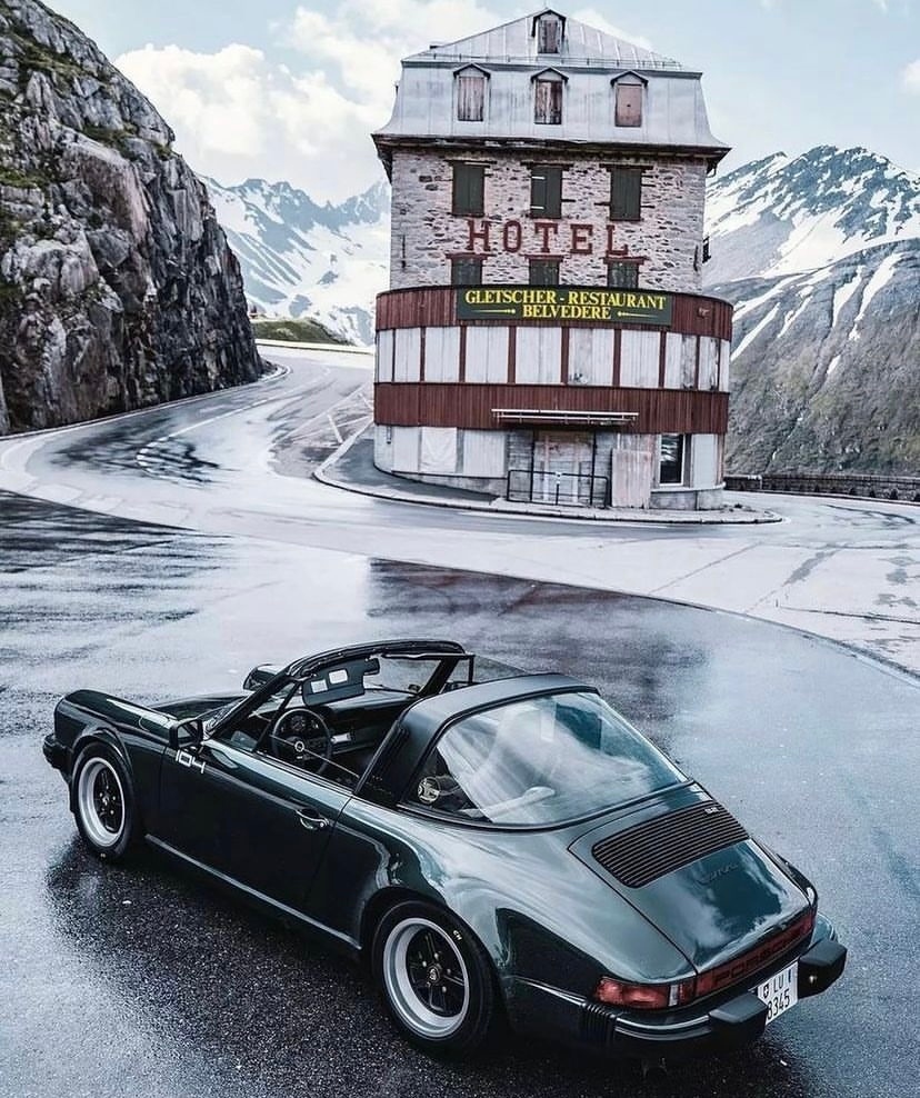 One of our favourite spots and one of our favourite cars; a Porsche 911 targa parked on the Furka Pass, with an elevation of 2,429 metres.

#porsche911 #targa #porsche #classic #car #classiccars #cars 

Photography by <a href="/alpineracer/">leslie page</a>.ch