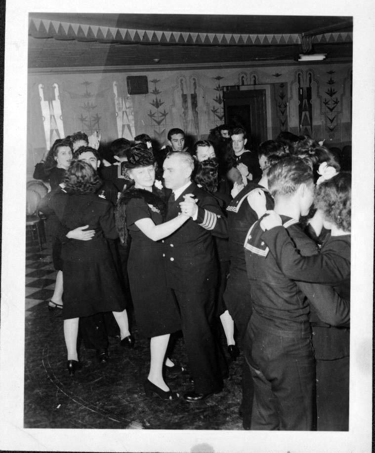 battleshipnc's tweet photo. The Ship’s Christmas dances at the Hotel Savoy Plaza, NYC, were huge successes. The first group of 125 officers and men on 12/11/46 included Captain and Mrs. T.J. O’Brien, shown dancing (center). Joe Goss and his orchestra provided music that was “just g… https://t.co/I1nZy6vcUY https://t.co/VVAMERwtj3