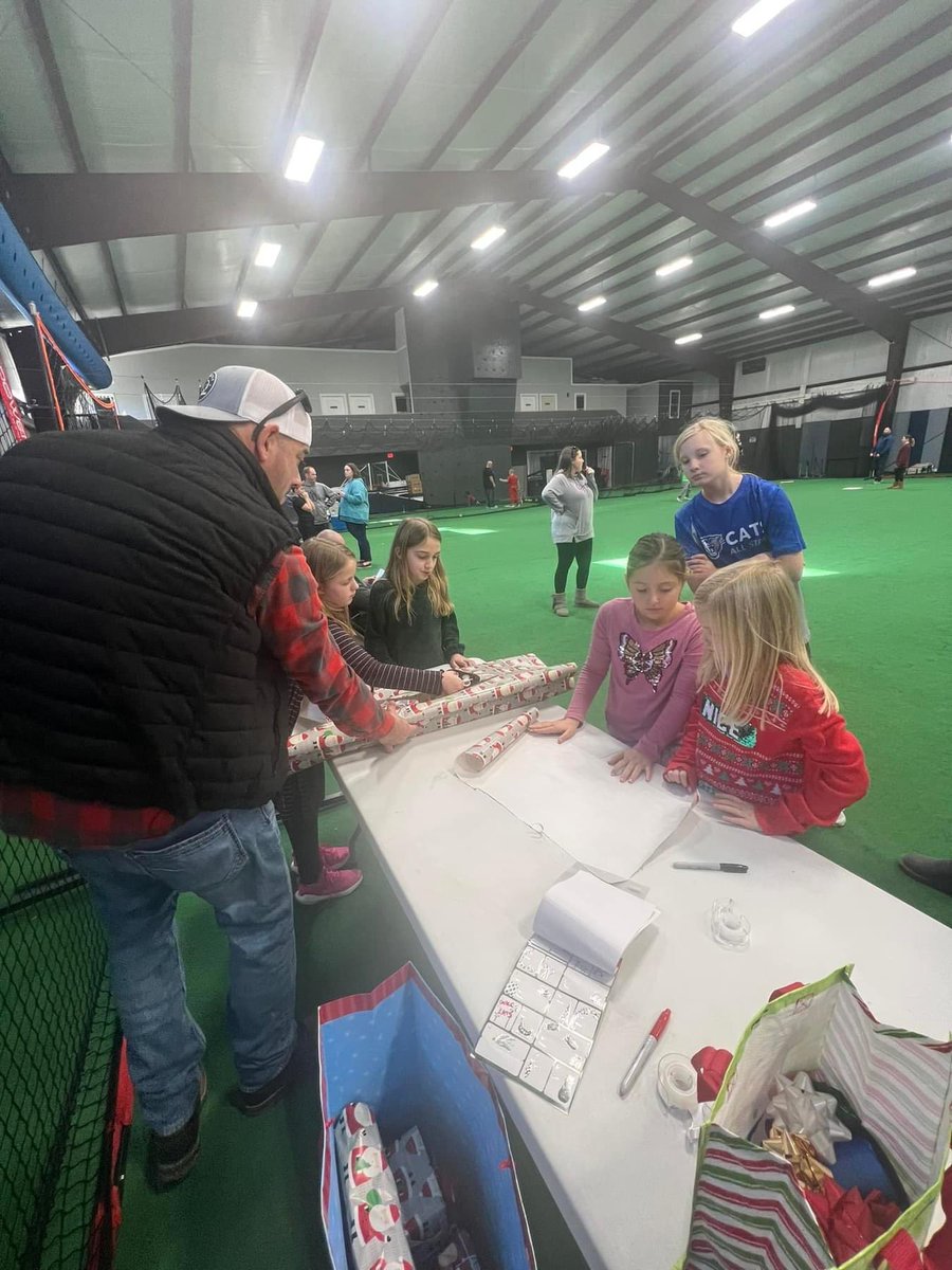 MudsockSoftball's tweet photo. Hats off to our 8u Cats All-Stars as they wrapped presents for a family they sponsored this holiday season.  We are proud of you ❤️ https://t.co/66U660sPjj