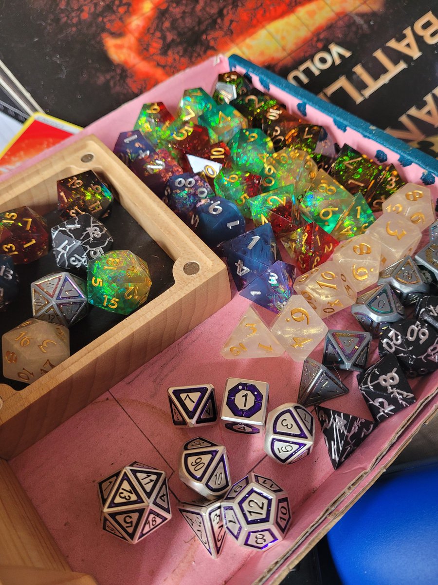 dakotairishIE's tweet photo. Give us an estimate on how many sets of dice you think you have? 🎲

📷: @kalika87 https://t.co/wG97ZC1xVL