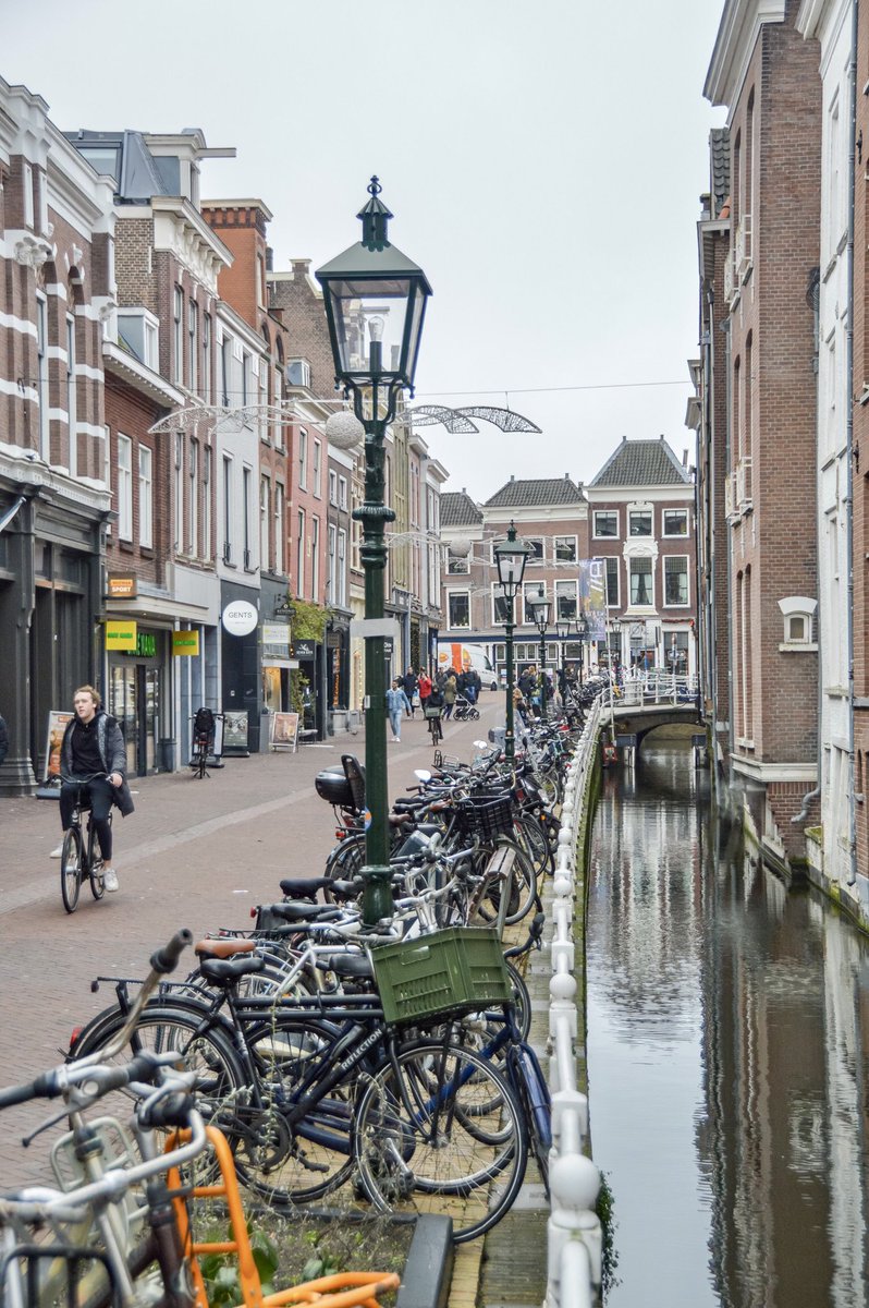 Just 20 years ago, cars could freely enter and park in Delft’s historic core. 

Then a center-left coalition narrowly (19-18 votes) passed an autoluwe binnenstad (‘low-car city center’) policy.

Now not a single resident or merchant misses the days when cars choked their streets.