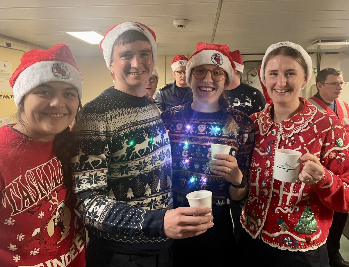 HMS_Spey's tweet photo. A little rain didnβt stop us. Relocated to the gym @HMS_SPEY kicked off festivities with a Christmas Carol service. Thank you @OpChristmasBox for the Christmas hats, and our Chefs for mulled wine and mince pies! Merry Christmas everyone! πππ
#DeployedChristmas
#Christmas2022 https://t.co/m1X6jq5kno