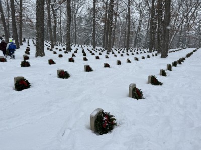 DematicAmericas's tweet photo. This past weekend, several @DematicGlobal teams around the US volunteered their time with @WreathsAcross, participating in wreath-laying ceremonies in honor of our Veterans. Our teams were able to hear from Veterans and help place wreaths on military gravestones. #LifeatDematic https://t.co/MFx6FxBSBb
