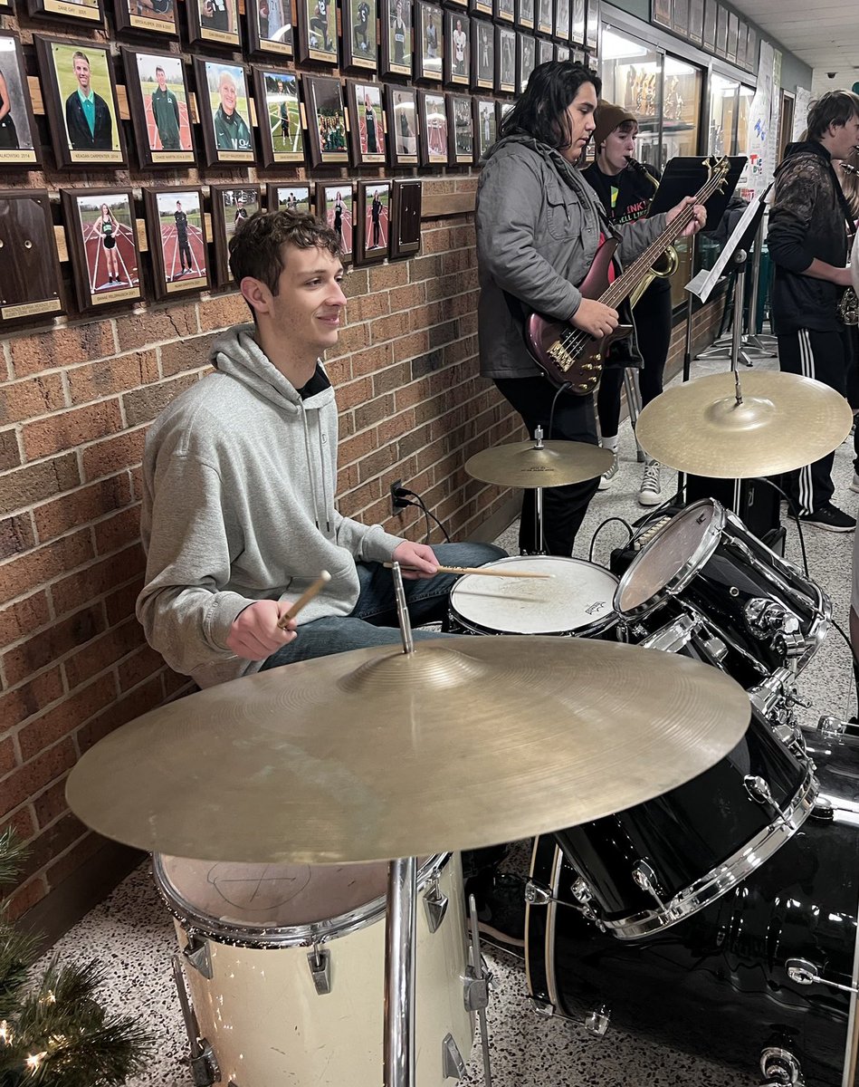 OlivetBoysHoop's tweet photo. Our not-so-little drummer boy, senior Dawson Redfield, was part of the OHS jazz band that played holiday music for staff &amp; students as they came into school this morning. 🥁🏀 https://t.co/3HX6HvxHlJ