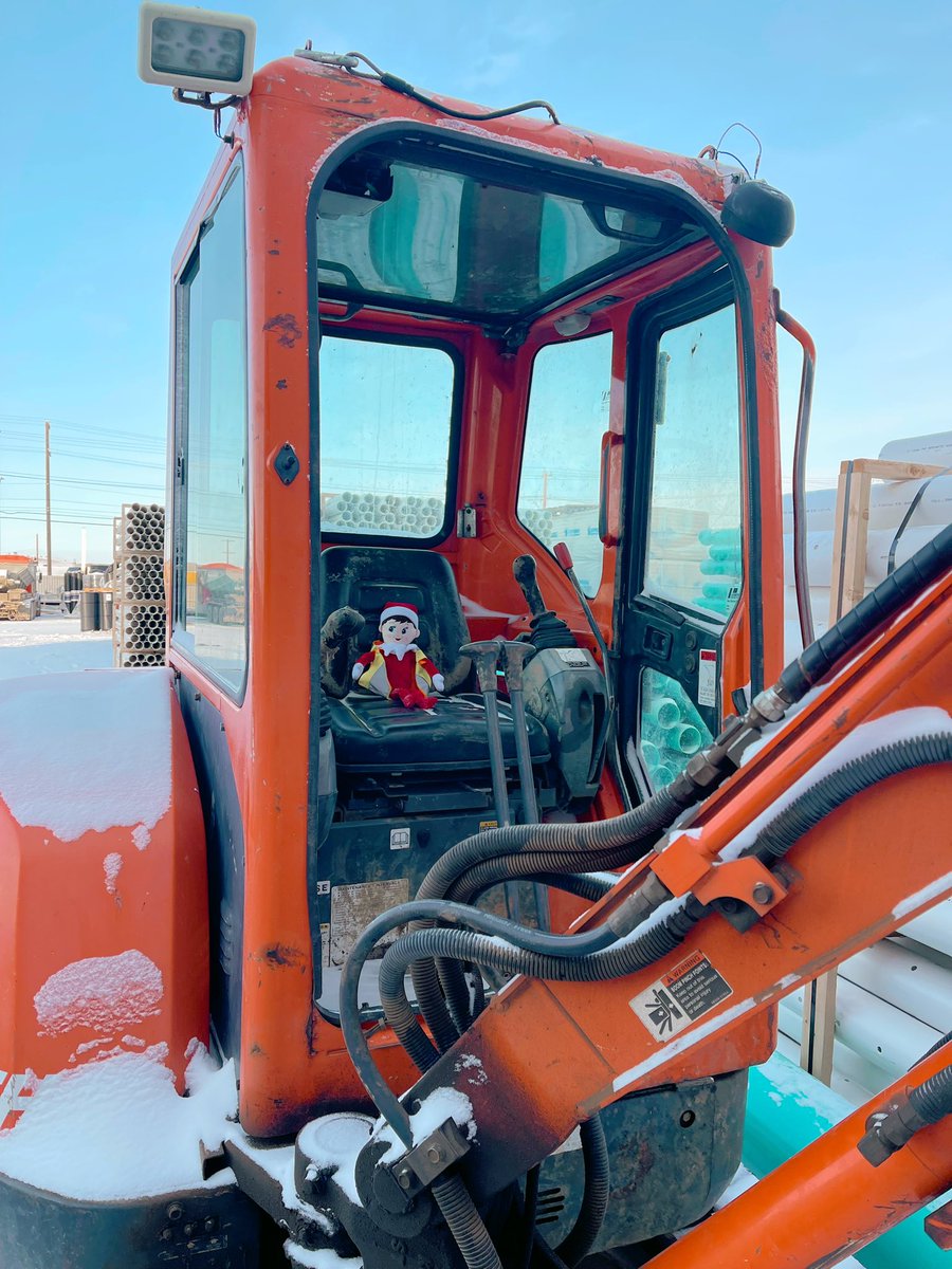 LenbethEdmonton's tweet photo. Trenching through the snow, on the one horse open Kabota? Digging sumps innn, your new walkout basementttt. 🔔🎄 #Lenbeth #elfontheshelf #yeg #edmonton #christmas https://t.co/UoM5ej33M6