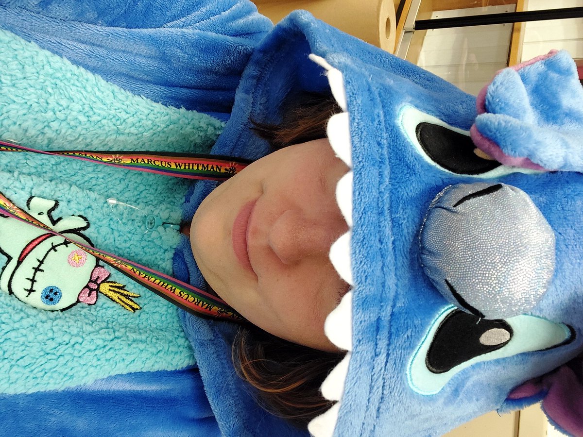 ShawnaTurco's tweet image. Door decorating contest and I chose my Stitch onesie for Christmas in Hawaii themed day @MWCSDTweets @MarcusWhitmanHS 
#teacheronashelf #greatdaytobeawildcat