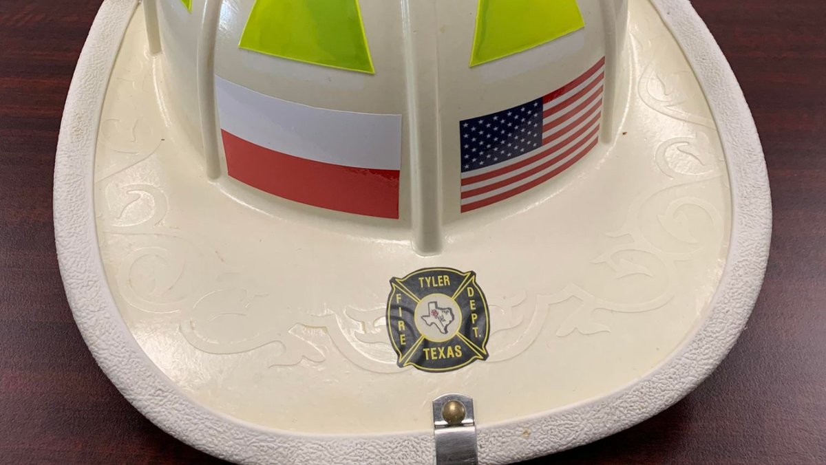 <a href="/CityofTyler/">CityofTyler</a> This decommissioned <a href="/TylerFireDept/">TylerFireDept</a> helmet is white, signifying a chief, and features custom lettering that reads 'Guardian of Poland' for the <a href="/Jelenia_Gora/">Miasto Jelenia Góra</a> fire brigade.

More on how this could deepen ties between the sister cities: bit.ly/3hNHb58