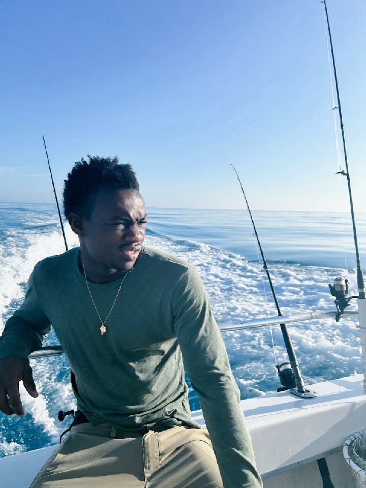 Baltimore on the open sea; Josh caught one fish.  Brian the Irish Jamaican caught 7.   Kevin caught some neon blue fish he had to send back. The Ole Malonester, a land lubber- found a bar- good haul at that bar.   Yup.