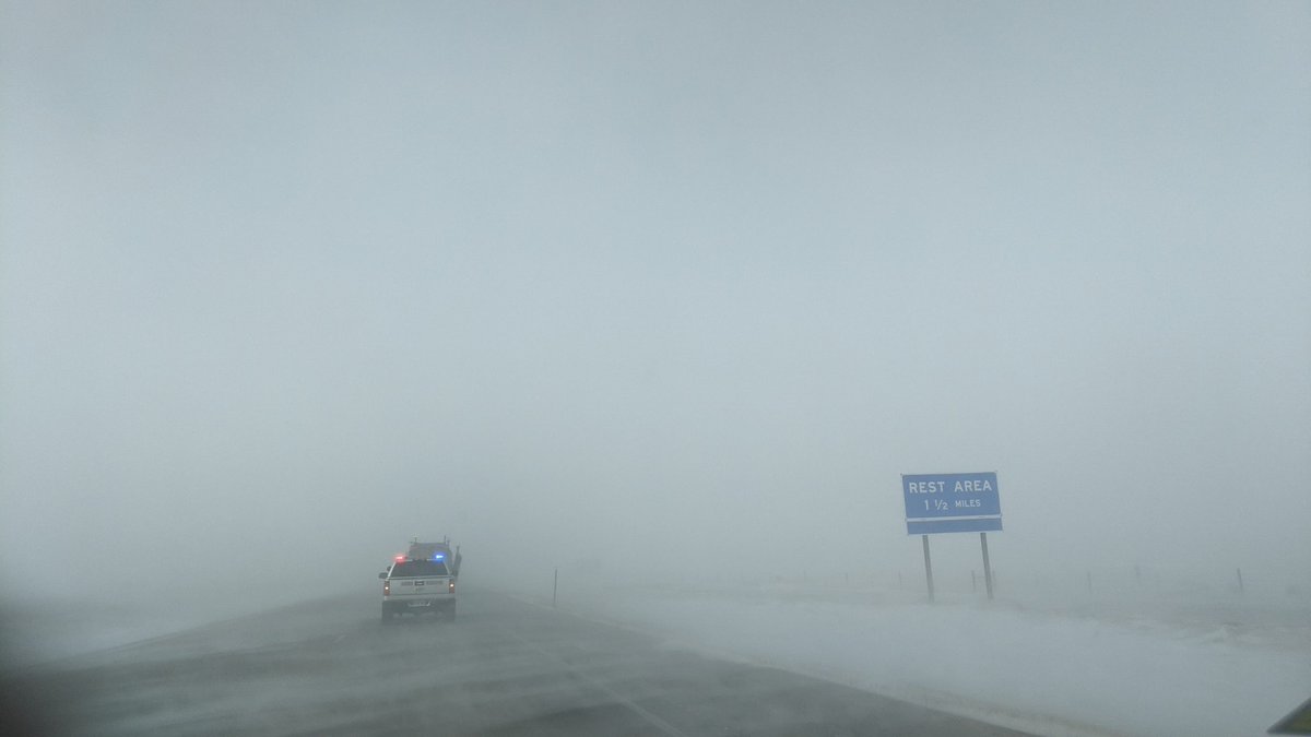 PennCoSheriff's tweet photo. First escorted group from Wall to Rapid City lead by @SouthDakotaDOT plow and @SDHighwayPatrol trooper are still slowly moving towards Rapid City. In two hours they made it from Wall to New Underwood exit. Even with those resources this commute is extremely difficult! https://t.co/HvxT0dgOsZ