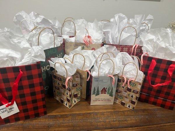 Law Club dropping off gift bags for the deputies at our Free Home precinct.
