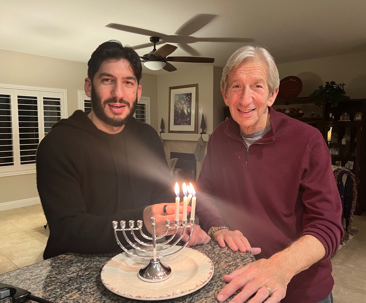 NBA agent Dan Poneman celebrating Hanukkah with his dad & former Brandeis 🏀 standout Fred Poneman. 🕎

#JCA | #CoachesLightCandles | #HappyHanukkah