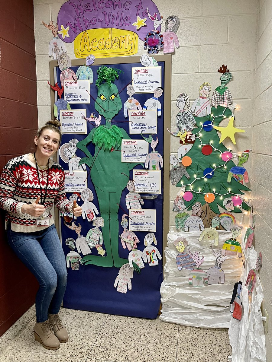 Noyce scholar, Cam, &amp; her mentor, Leigh, compete in the "Deck the Halls” competition at Schenectady HS with their anatomy phys/Living environment door! Happy Holidays! ❄️