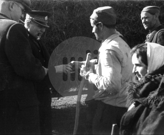 Broz1892's tweet photo. Marshal Tito on the way to Titovo Užice (People's Republic of Serbia), stopping in a nearby village, handing out cigarettes and conversing with peasants working their land. - December 12th, 1957. https://t.co/3zOREBsAJA