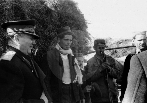 Broz1892's tweet photo. Marshal Tito on the way to Titovo Užice (People's Republic of Serbia), stopping in a nearby village, handing out cigarettes and conversing with peasants working their land. - December 12th, 1957. https://t.co/3zOREBsAJA