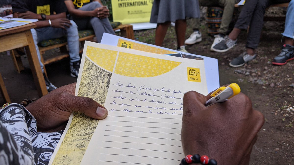 PRwamigabo's tweet photo. #EcrirePourLeDroit lancée par @amnesty est une campagne mondiale de rédaction des lettres adressées aux personnes incarcérées innocemment et aux bourreaux des cet acte injuste. Elle s'est tenue ce vendredi 23 dec à l'espace #GomaslamSession . @cruzz_taylor #W4R22IMEvent https://t.co/Ly2MFaeqbf