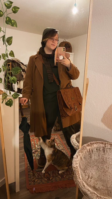 running one errand looking like the main character of a british movie 