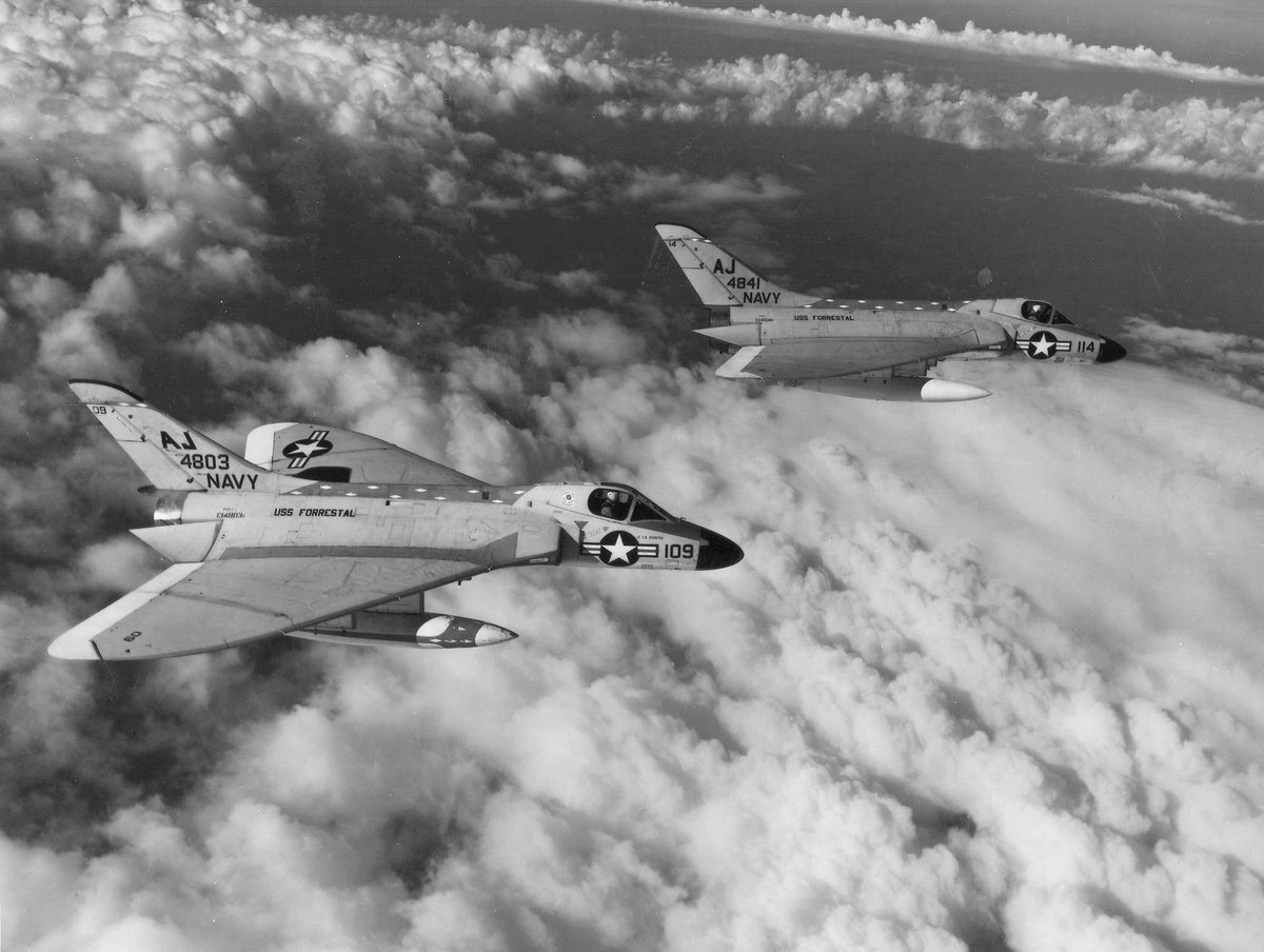 Two Douglas F4D-1 Skyray fighters of VF-102 "Diamondbacks" in flight, April 1960