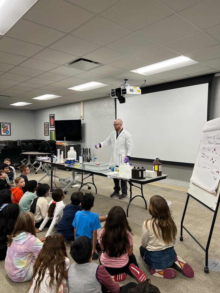 MrsWhite96's tweet photo. A huge thanks to my brother, @Evan_Z_Dalton, an analytical chemistry Ph.D student at @IndianaUniv for returning to Ivy Hall to share some chemistry demonstrations with our 4th graders! We learned about chemical potential energy which fit perfectly into our science unit.#inspire96 https://t.co/rMCbSRPTc3