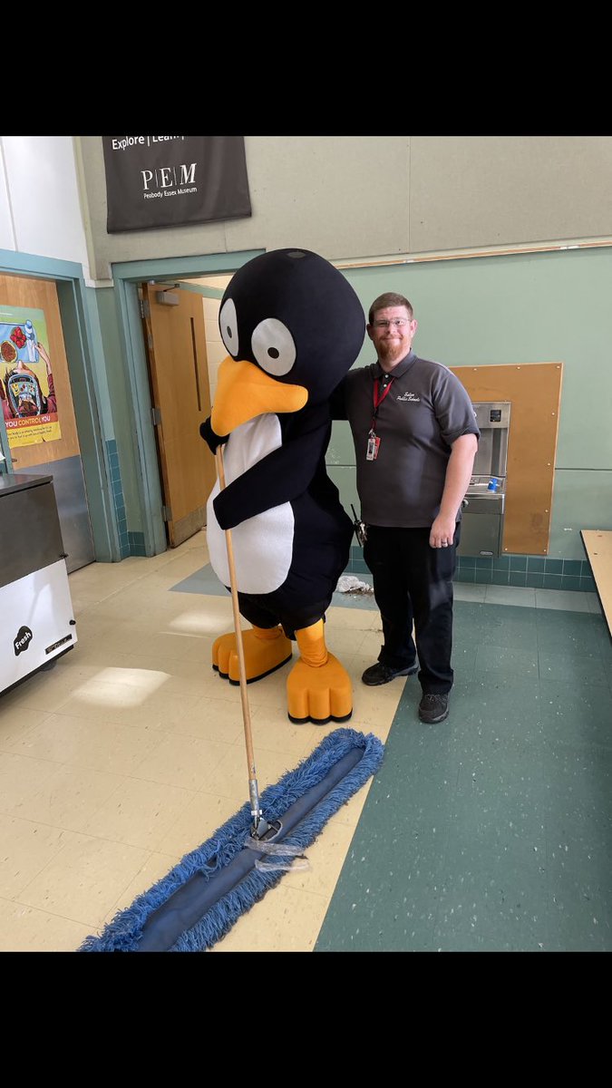 JIJI assisting with after lunch clean up!