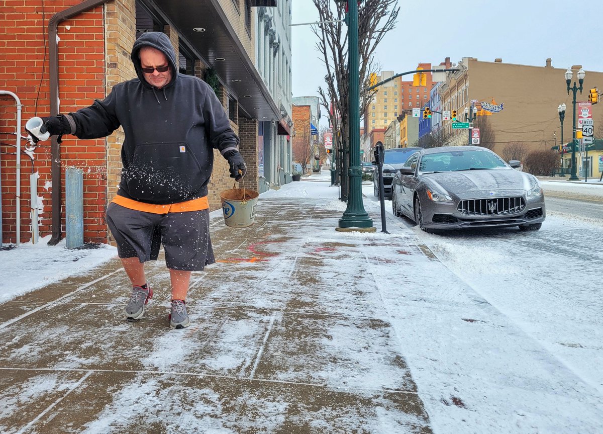 MikeJones412's tweet image. John Mercer sprinkles salt on the sidewalk in front of Keystone Club in #WashPa while wearing shorts in the bitter cold Friday morning.

When asked about his attire, he responded: "Yeah, I'm about to go back inside."