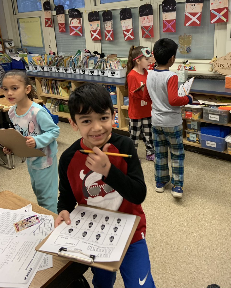 JenMirdala's tweet photo. We went on an elf hunt and taped Mr. Chiera to the wall…what a way to start our winter break! See everyone in 2️⃣0️⃣2️⃣3️⃣!🎉⛄️@IAES18Chiera https://t.co/POGzU6jbxb