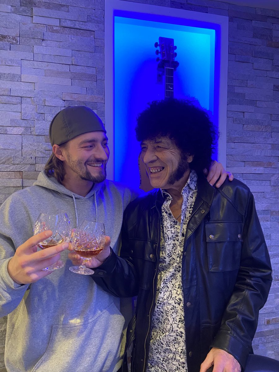 Enjoying a brandy with son Miguel who has just arrived back in the UK. At one time it was the parents that said to their sons, “Get yer haircut”