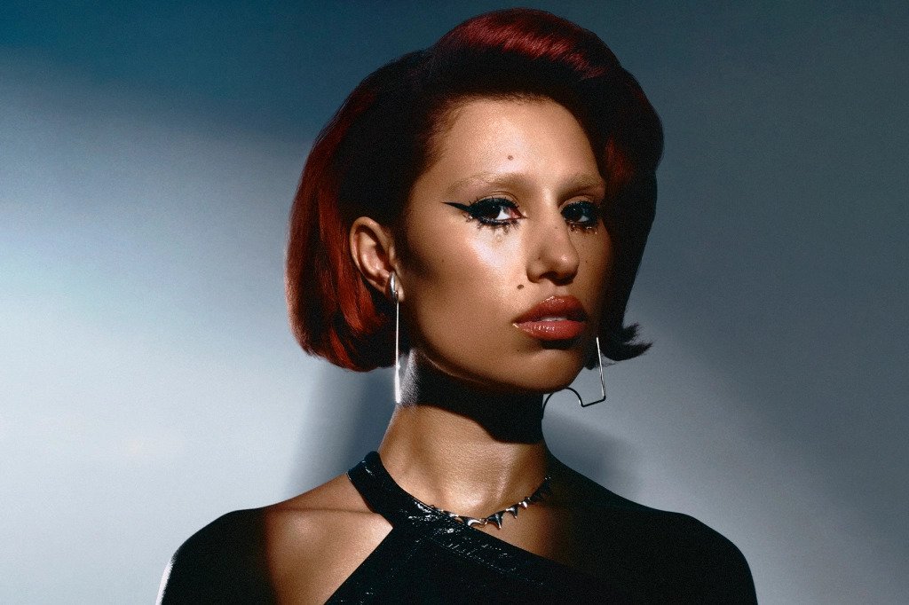 Congratulations to <a href="/raye/">RAYE</a> who claims this week's highest-charting non-Christmas song with Escapism. 🖤 #XmasNo1 bit.ly/3YKkcZn
