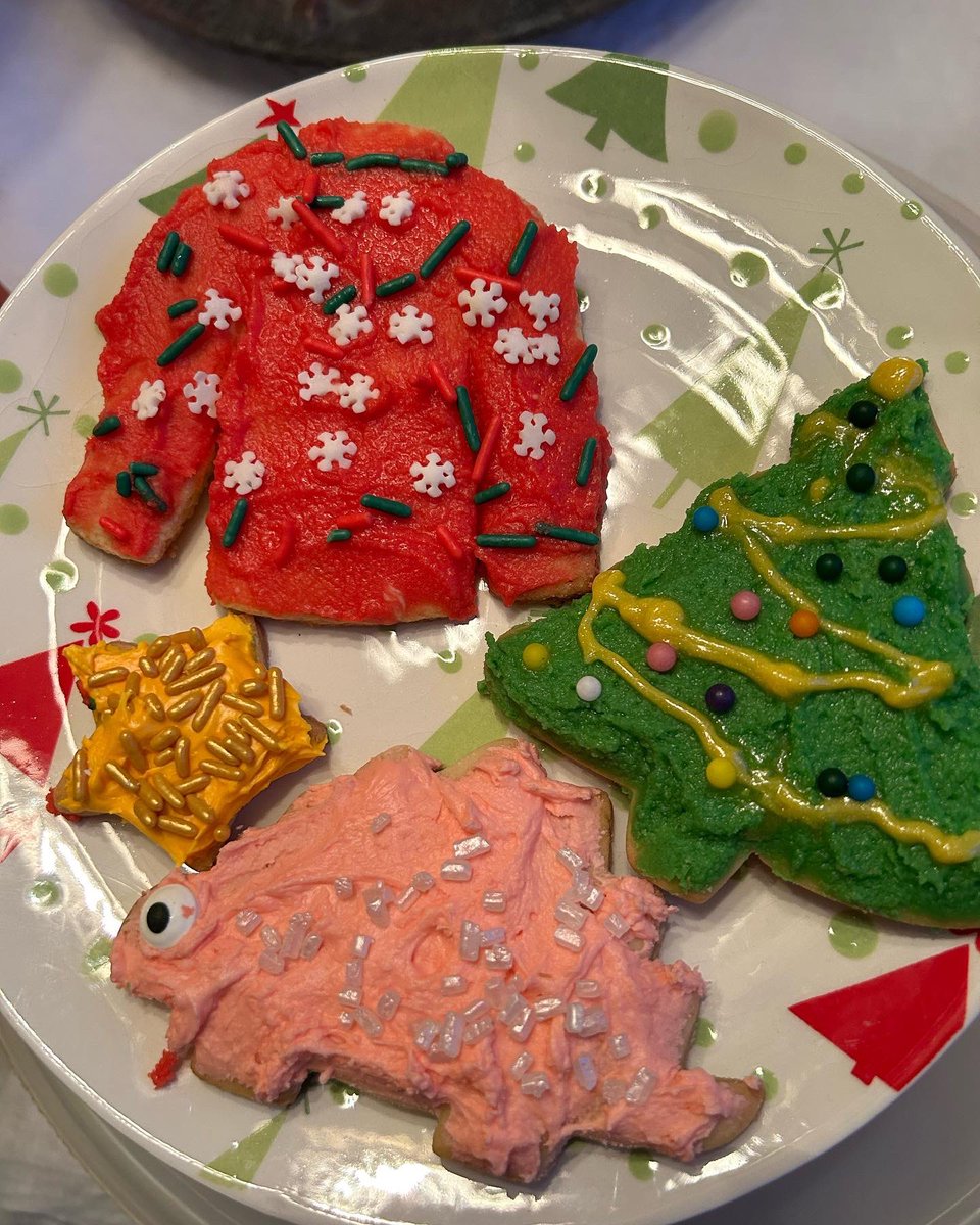 About 5 years ago my youngest daughter insisted on including dinosaurs in the cookie cut-outs. And so a new tradition was born…