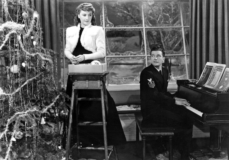 sbliss89's tweet photo. My favorite genre of Christmas movie is Barbara Stanwyck watching hot guys play piano. #TCMParty https://t.co/bt2KkHeRva