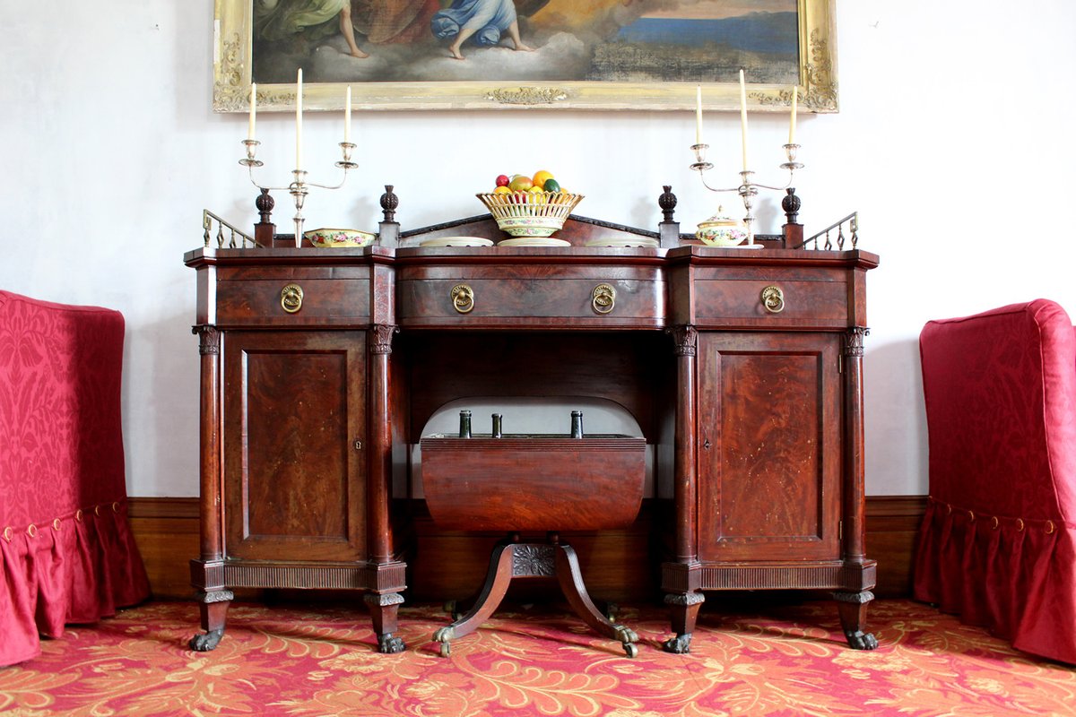"The sideboard at Hyde Hall is the most magnificent piece of furniture that George Clarke purchased. It is large, well-built, nicely proportioned, and includes finely executed carving and striking, figured mahogany."...

hydehall.org/sideboard/