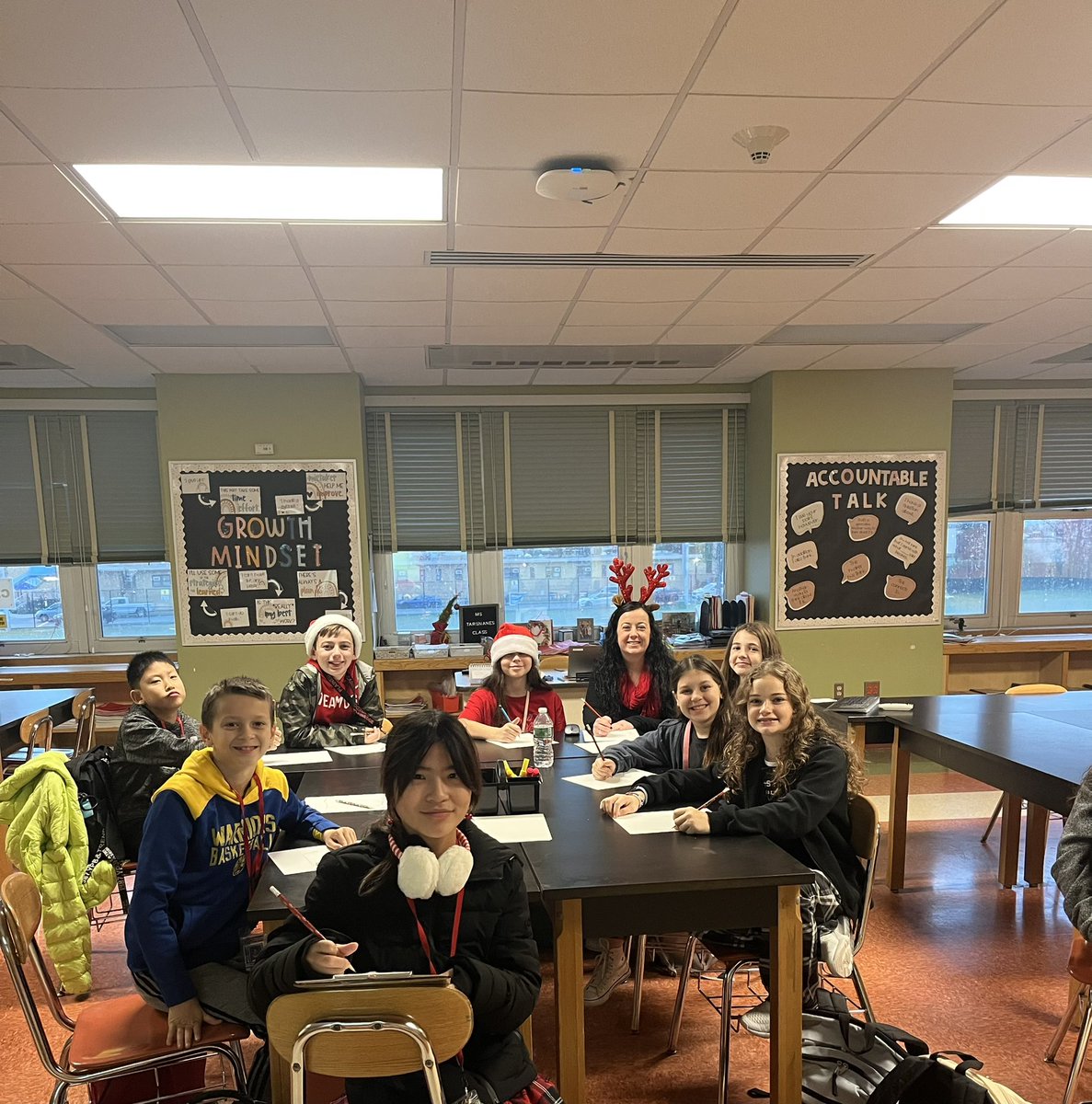 Ms_Tarsnane's tweet photo. What a FANTASTIC way to close out 2022 with my Dynamic Dolphins! Staff Caroling to greet students, drawing gingerbread houses in Advisory and ending the day with a full 6th grade movie to celebrate the completion of our interdisciplinary project! Happy Holidays!#WeArePlainedge https://t.co/otkC3voufz