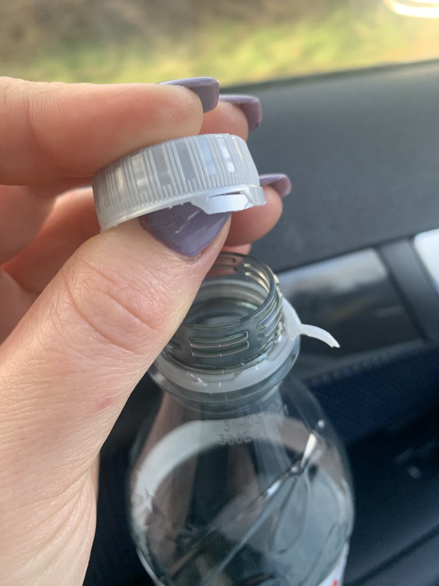 Jen_Tys's tweet photo. @CocaCola_GB @DietCokeGB Can we talk about the horrendous new seals on coke bottles. It would be safer to drink through a cheese grater. https://t.co/Ptx5sSOjSW