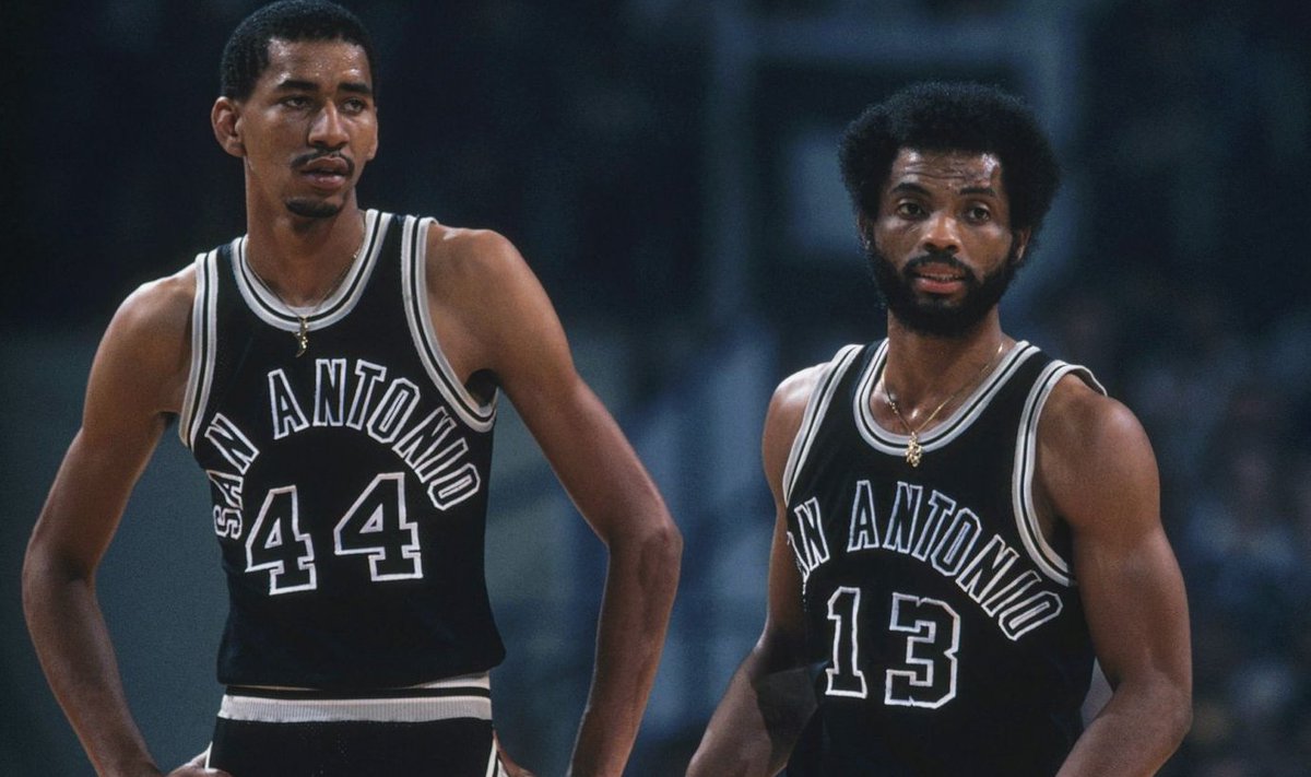 spurs's tweet photo. For #Spurs50, we’re telling stories of legendary players, moments, and chapters throughout our history.

Take a journey through 5️⃣0️⃣ years of Spurs basketball on the Spurs hub, which has all docuseries and podcast episodes, articles, photos &amp; more! 

🔗https://t.co/u4LnzIHj1s https://t.co/T0kYF0NPCU