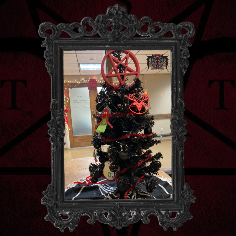 satanic_temple_'s tweet photo. Threats and vandalism did not stop TST West Virginia from installing their holiday display at the State capitol this week alongside Jewish, Rastafarian, Kwanzaa, and Festivus displays. Together we can ensure public spaces represent more than Christian hegemony. https://t.co/jJMc85MqnY