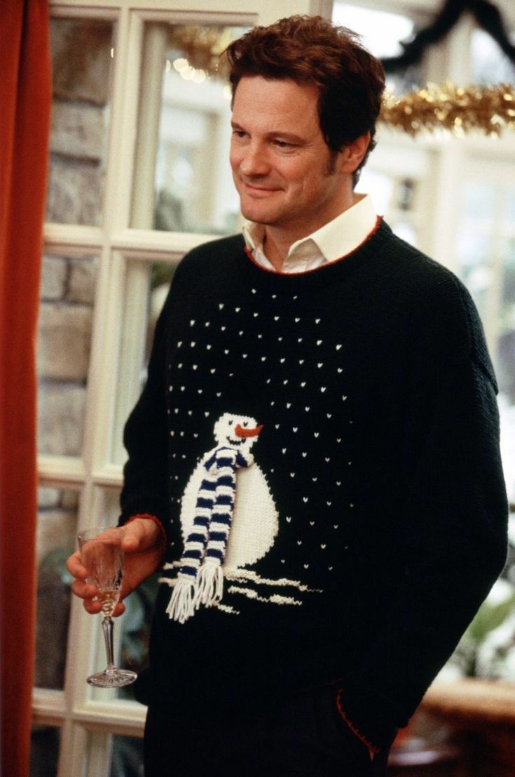 folkausten's tweet photo. colin firth as mark darcy wearing ugly christmas jumpers https://t.co/D7MoHZvby4