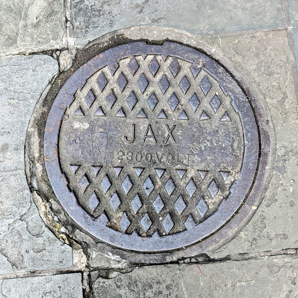 Walking in #NewOrleans. What does the 'D' mean? #hatchcovers #JAX #accesscovers #manholecovers #keeplookingdown